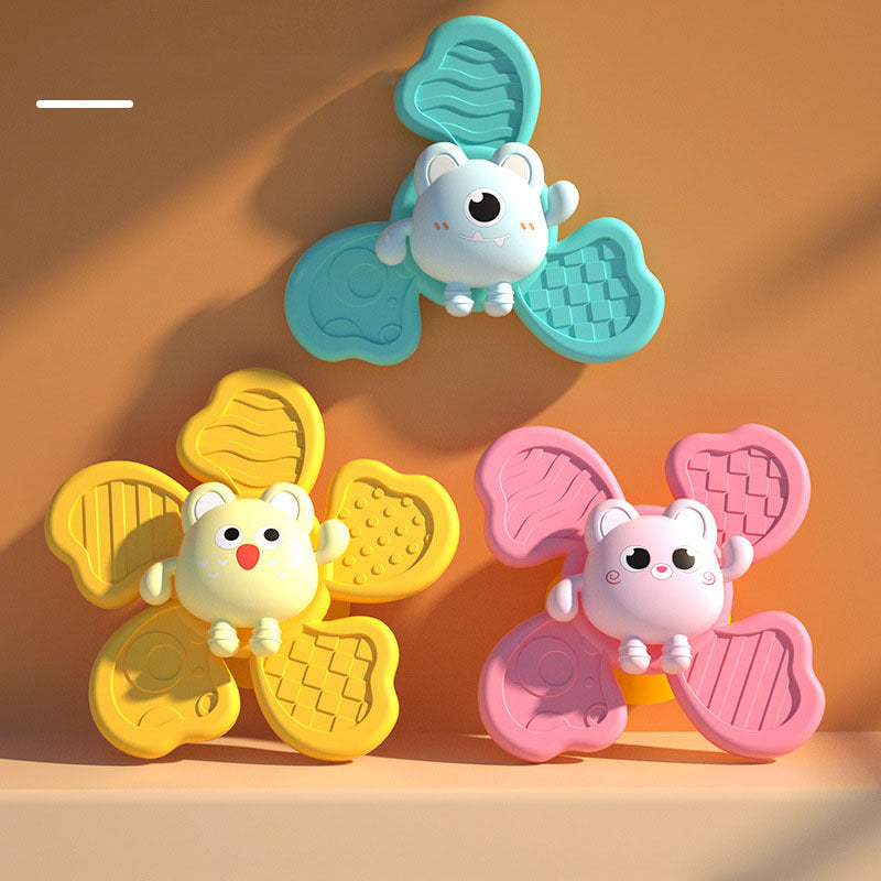 Colorful baby bath spinning toy with animal design and suction cups for infants and newborns