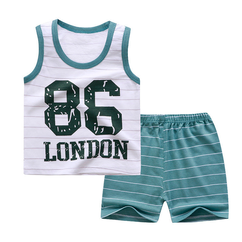 Child wearing short-sleeved cotton summer suit – shirt and matching shorts set for boys