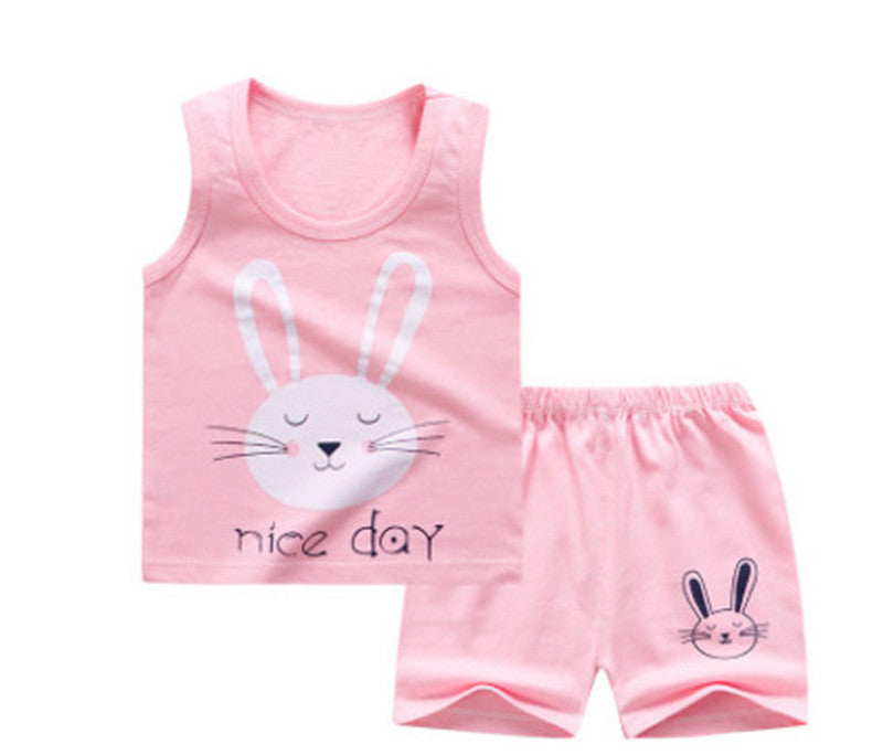 Child wearing short-sleeved cotton summer suit – shirt and matching shorts set for boys