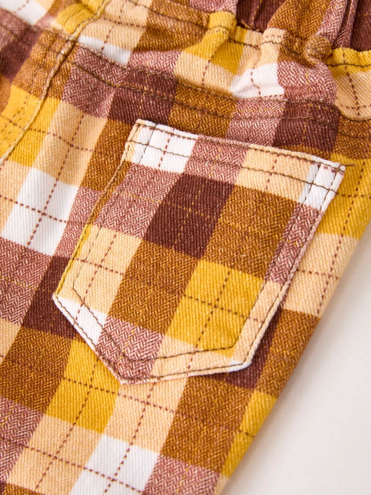 Pantalones de cuadros marrones de otoño con lazo para Acción de Gracias