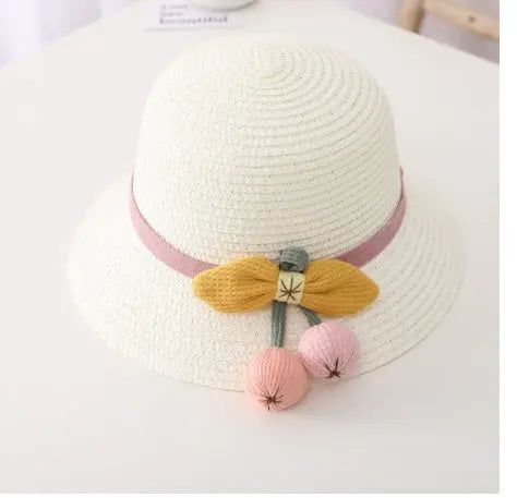 Children’s summer straw hat with wide brim for girls, providing stylish and breathable sun protection outdoors
