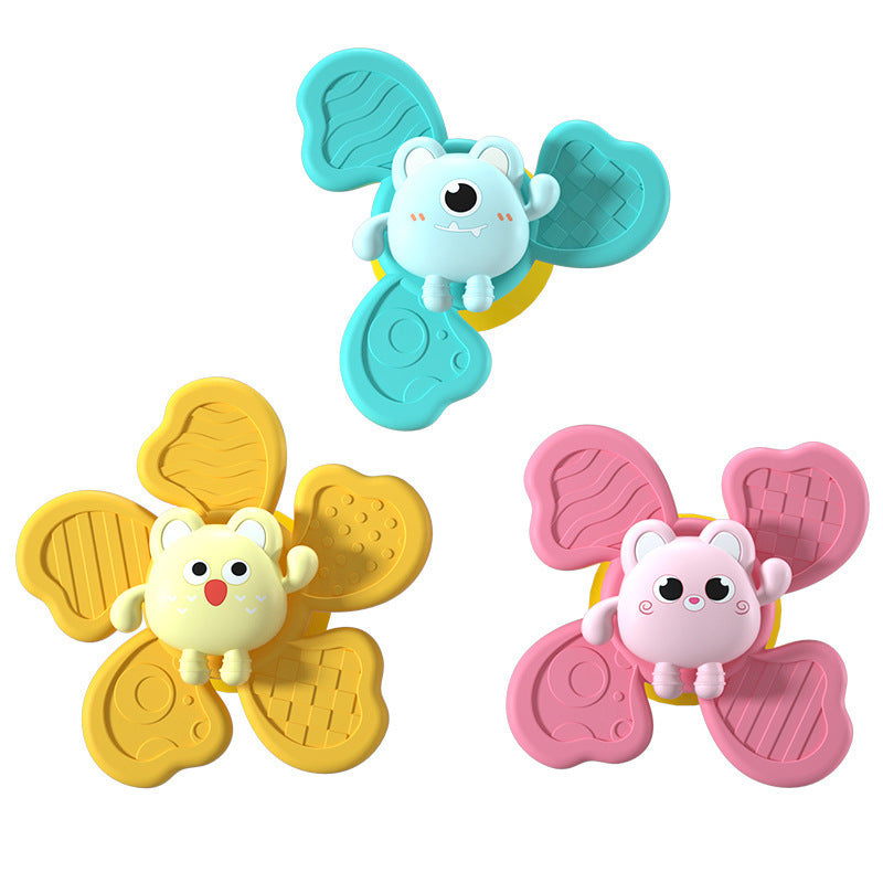 Colorful baby bath spinning toy with animal design and suction cups for infants and newborns