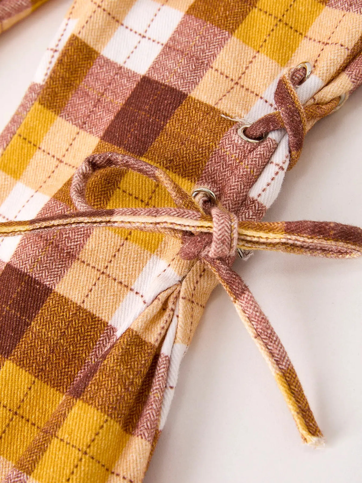 Pantalones de cuadros marrones de otoño con lazo para Acción de Gracias