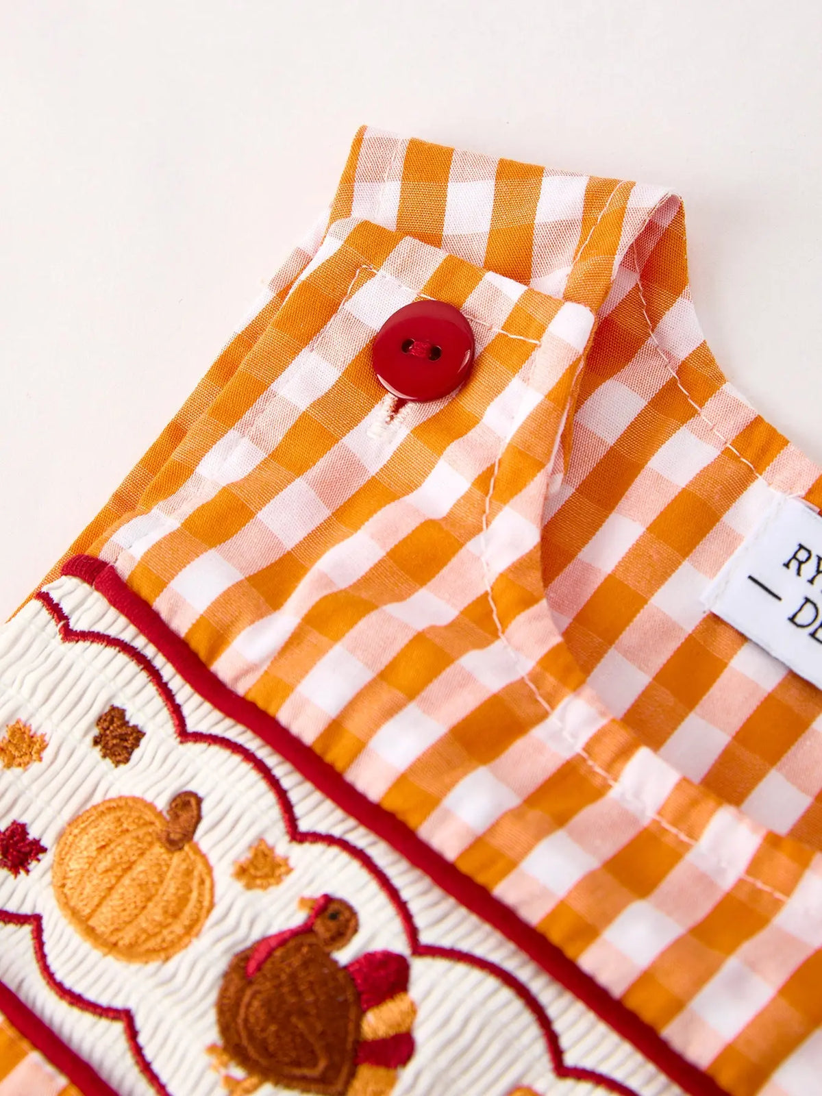 Fall Embroidered Romper for Baby Boys – Orange Checkered with Halloween Details Rylee Faith Designs