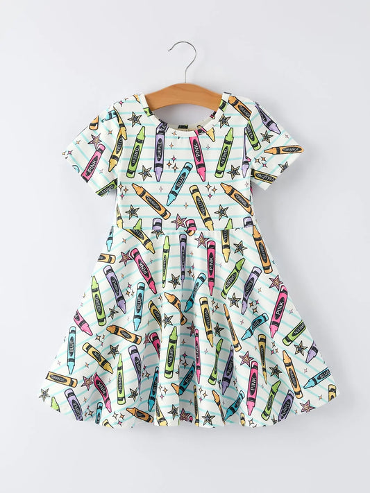 Vestido con estampado de lápices de niña para la vuelta al cole