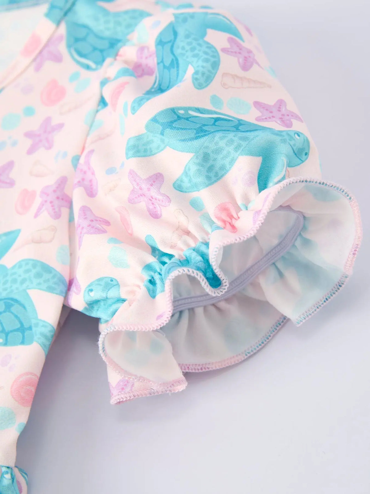 Vestido con volantes de tortuga marina para niña