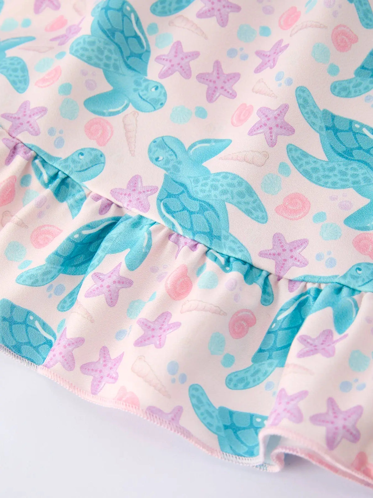 Vestido con volantes de tortuga marina para niña