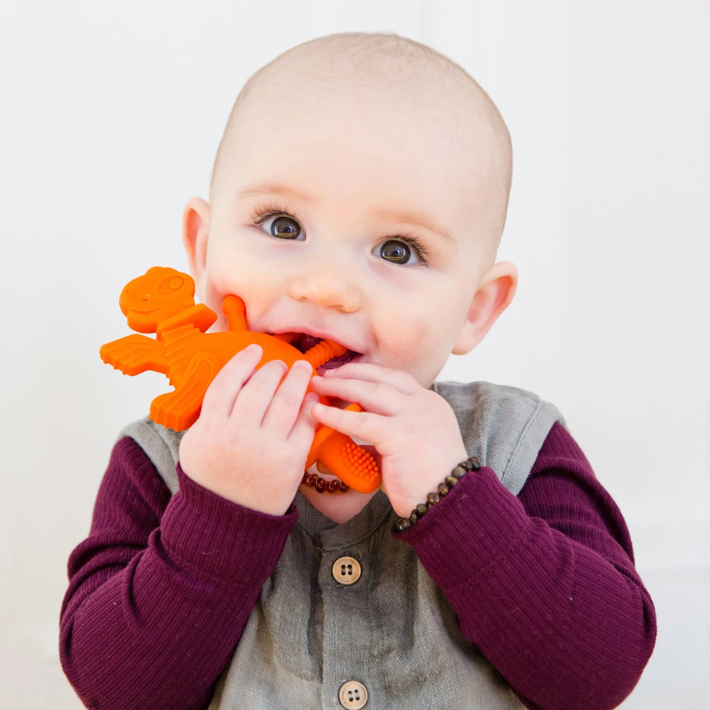 Dibly Baltic Amber & Natural Rubber Dinosaur Teether with Toothbrush Tail