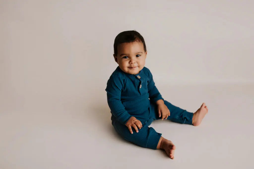 Navy Baby Ribbed Playsuit with pockets Three Little Tots