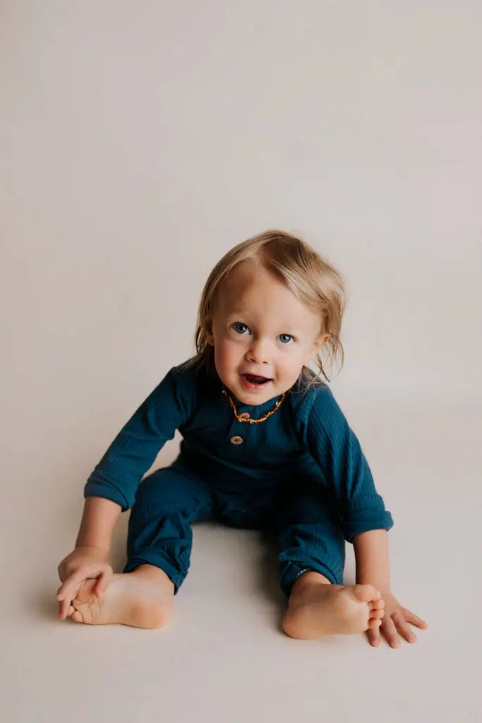 Navy Baby Ribbed Playsuit with pockets Three Little Tots