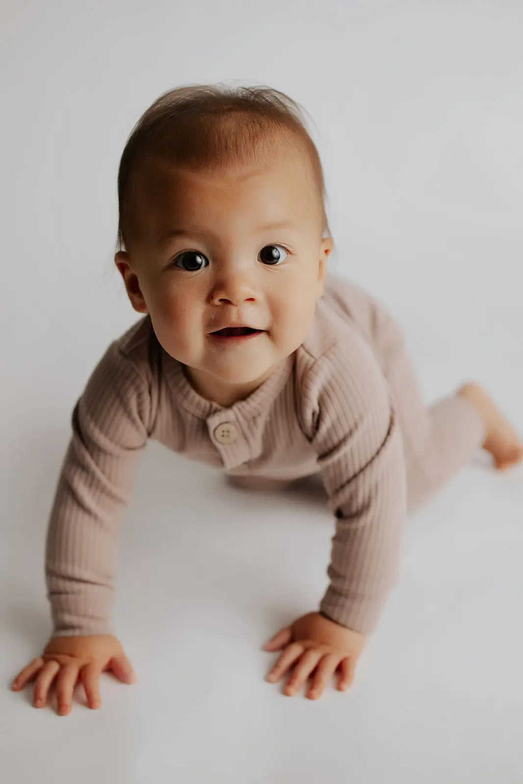 Mauve Baby Ribbed Playsuit with pockets Three Little Tots
