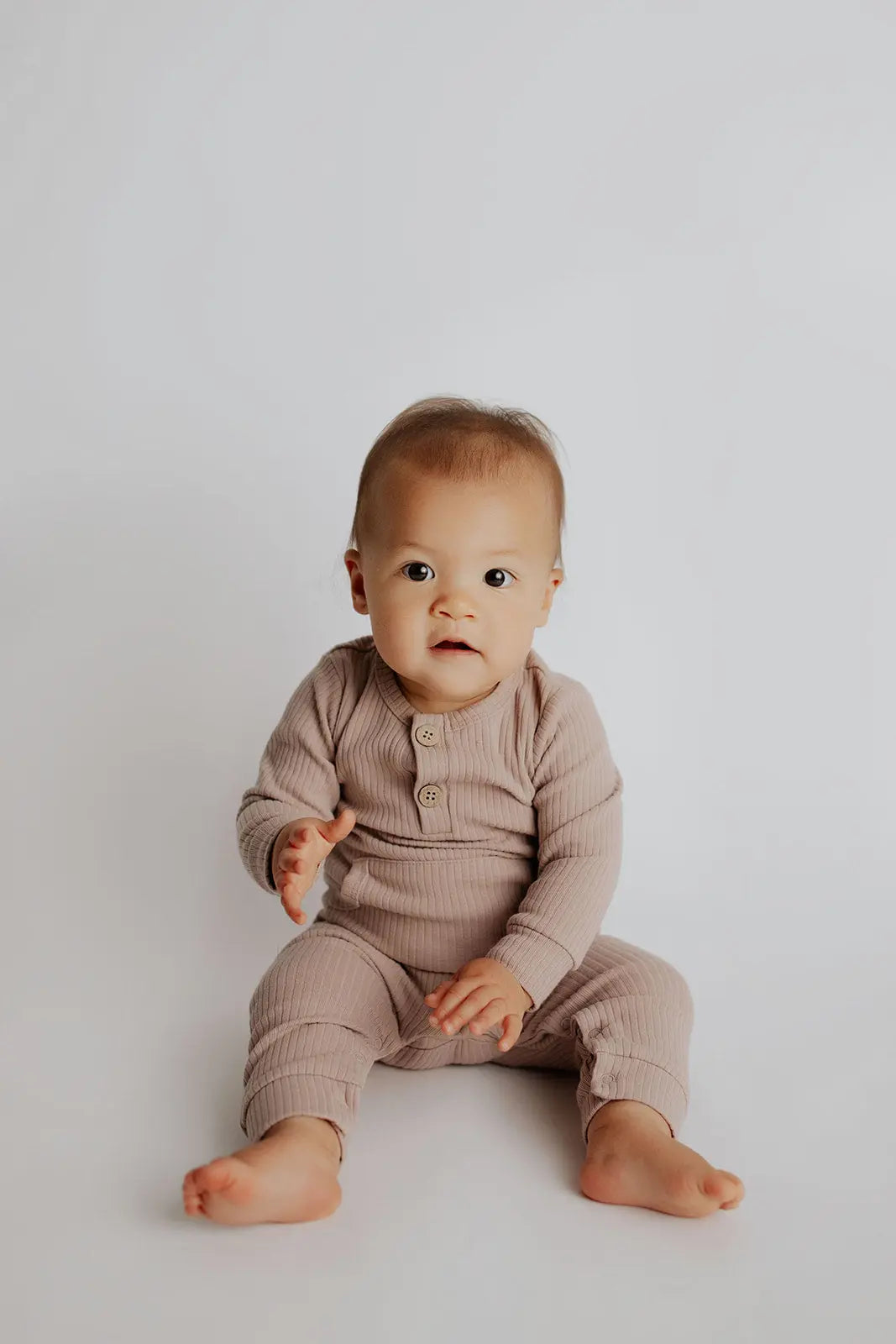 Mauve Baby Ribbed Playsuit with pockets Three Little Tots