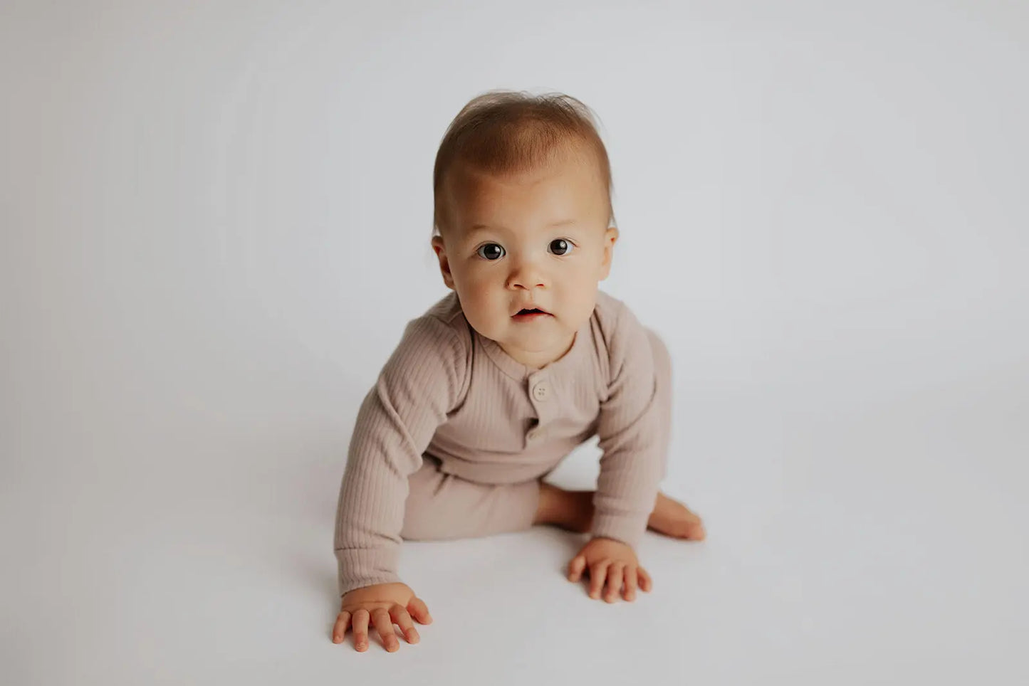 Mauve Baby Ribbed Playsuit with pockets Three Little Tots