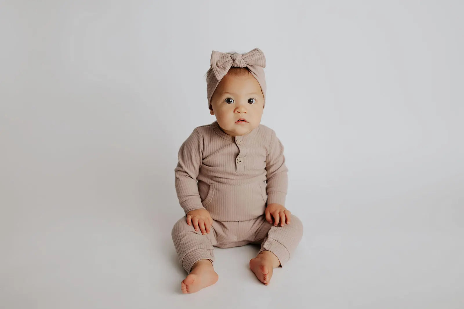 Mauve Baby Ribbed Playsuit with pockets Three Little Tots